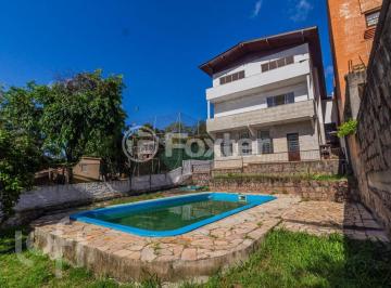 59-CASA-4D-TERESOPOLIS-PORTO-ALEGRE-258823.jpg · Casa à venda em Teresópolis com 432 m², 4 quartos, 1 suíte, 1 vaga