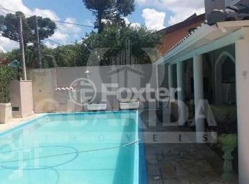 567216153_ImoGuaridaPrincipal.jpg · Casa à venda em Partenon com 188 m², 5 quartos, 2 suítes, 4 vagas
