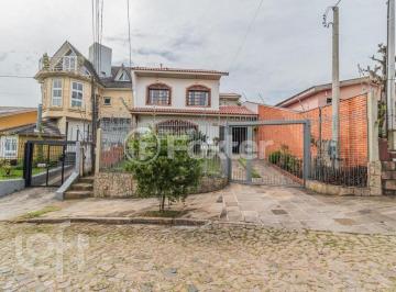 01-CASA-4D-CAVALHADA-PORTO-ALEGRE-311626.jpg · Casa à venda em Cavalhada com 244 m², 4 quartos, 1 suíte, 5 vagas