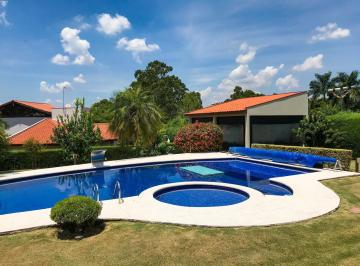 Piscina aquecida com cascata, seja bem-vindo! · Casa térrea de alto padrão no Condomínio Monte Belo em Salto/SP, pronta para morar, com mezanino, pi