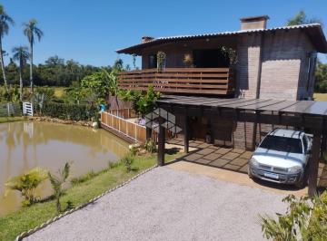 697629_iDZ292Cv_6976296839eabfeb71c.jpg · CHACARA EM PINHERAL COM 04 DORMITÓRIOS