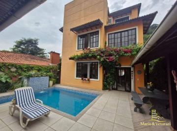 f0fc44ddeb075eb9ca5c1e0fad518d28a761de67 · Sobrado tríplex com 5 suítes à venda, 240 m² por R$ 1.650.000 - Tombo - Guarujá/SP