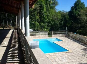 uqxcsbc2njliyjc4odgwotu0_md · Chácara 6.400 m², 3 dorm, 1 suíte, varanda, piscina, bosque, aceita permuta