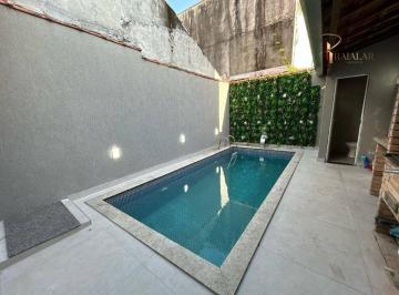 8e0d8c9c7df739869fbb288ffeb61169026d367d · Casa com Piscina e 2 dormitórios à venda, 95m² - Vila Mirim - Praia Grande/SP