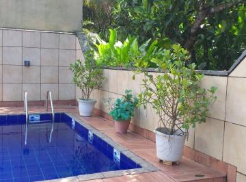 piscina · Casa na Riviera de São Lourenço