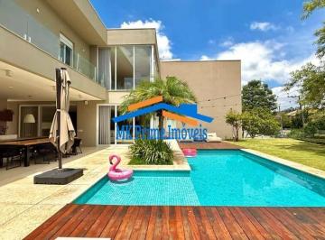 Casa · 402m² · 4 Quartos · 2 Vagas · Cond. Nova Higienópolis - Moderna, integrada e completa, com 4 suítes!