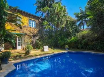 Foto 03 · Luxuosa casa de alto padrão de 4 suítes no Jardim América: 6 salas, 8 banheiros, 12 vagas de garagem