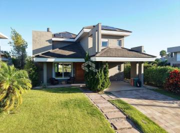 698355_i96GeceG_6983556841cf7daf156.jpg · Casa condomínio Villagio de Atlântida em Xangri-Lá, 04 suítes, 02 vagas