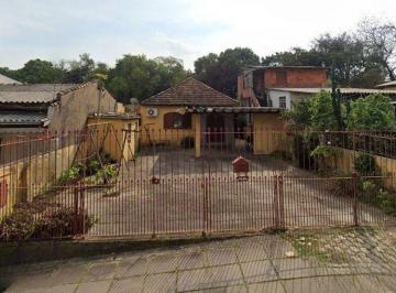 Casa · 70m² · 3 Quartos · 4 Vagas · Excelente imóvel com terreno amplo à venda no Jardim Itu – Porto Alegre