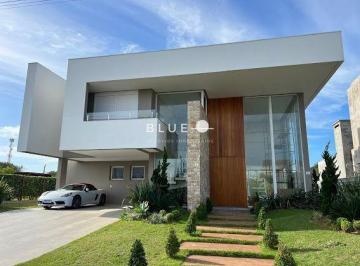 Casa · 360m² · 4 Quartos · 2 Vagas · Casa com 4 suítes em condomínio beira mar em Torres RS