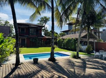 Casa · 267m² · 4 Quartos · 3 Vagas · Belíssima casa de canal em condomínio de alto padrão em Angra dos Reis/RJ