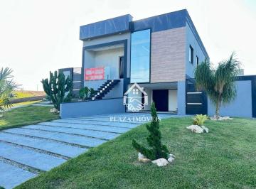 Fachada · Casa com 3 dormitórios, 130 m² - venda por R$ 650.000,00 ou aluguel por R$ 5.000,00/mês - Balneário 