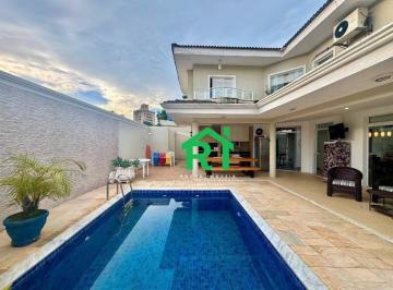 fb595598b9dde57482a1c0b8e0b4b180ac35cb7a · Casa com 3 quartos (1 suíte), 4 vagas e lazer à venda no Tombo, Guarujá | Rocha Imóveis Guarujá