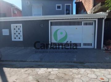 Foto 03 · Sobrado em excelente localização para venda com 3 dormitórios (1 suíte) no Centro de Cananéia-SP