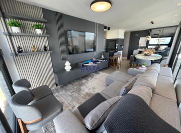 Living · Apartamento de luxo com sacada mobiliado a venda no Predial em Torres