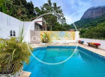 Casa · 600m² · 6 Quartos · 2 Vagas · Triplex de Luxo na Gávea: Conforto, Sofisticação e Lazer com Vista Deslumbrante