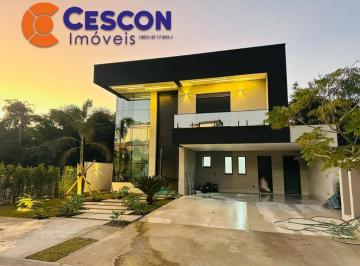 Foto 01 · Casa de luxo em condomínio na Aldeia da Serra com 4 suítes e 6 vagas de garagem - Santana de Parnaíb