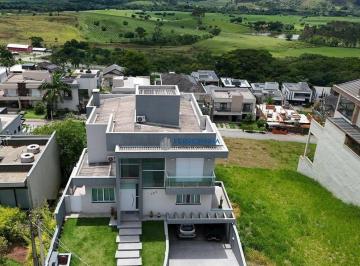 73fa7fcb7455f8e0ceb0f2a82aa2b7972e7bb903 · Casa com 3 dormitórios à venda, 443 m² por R$ 3.400.000,00 - Condomínio Residencial Jaguary - São Jo