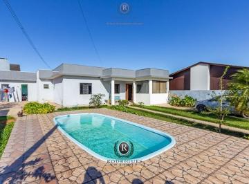 24484483_4.jpg · Casa venda Torres com piscina 3 dormitórios