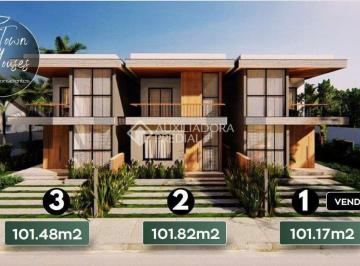 Foto 1 · Sobrado com 101m², 2 quartos, jardim e energia solar em Garopaba