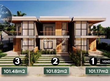 Foto 1 · Sobrado com 101m², 2 quartos, jardim e energia solar em Garopaba