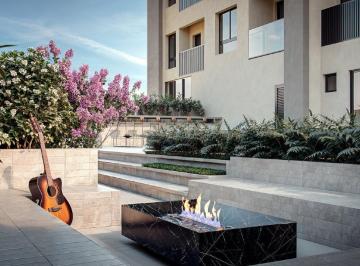 Fire place ao ar livre, com lareira e bancos (imagem ilustrativa) · Apartamento diferenciado com terraço à venda no bairro Fazenda, Itajaí