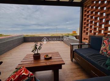 705771_iQA2K_7057716806c3caa5748.jpg · Casa pé na areia