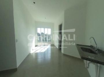 cozinha e salas integradas com varanda · apartamento de dois dormitórios sendo um suíte com uma vaga de garagem.