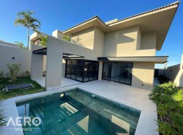 24f6fa3485390038054ccda1238fc4ab7b828a85 · Casa com 4 dormitórios à venda, 231 m² por R$ 2.100.000,00 - Residencial Tamboré - Bauru/SP