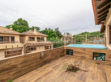 05fbac0f-9890-4061-a936-edcd5a624d74.jpg · Casa em Condomínio, 3 dormitórios, 299.57 m², em Tristeza