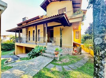 01 · Casa a venda na Lagoa da Conceição, com 295 m² privativos, estilo clássica