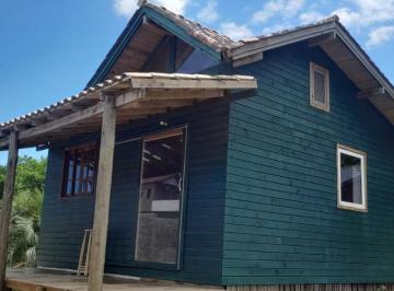 713308_inp154848o657LR11_713308682e47ef7cc12.jpg · Casa com terreno na Ribanceira