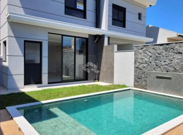 681796_i2Y23u8iW2_68179667ae33e9b62ed.jpg · Belíssima Casa 3 Dormitórios (uma suíte master) com Piscina no Condomínio Jardim dos Cedros - Praia 