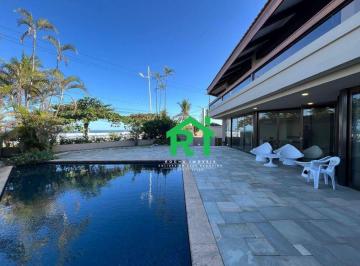 c070214906fb59683c9a5d7b55a4a8a998e3440a · Casa frente mar com 5 dormitórios (3 suítes), 4 vagas, lazer, Enseada, Guarujá/SP