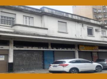 Comercial · PRÉDIO CONSISTENTE EM UMA CASA E DUAS LOJAS NO PAVIMENTO TÉRREO, SOB OS NÚMEROS 61, 63, 65 E 67, NA