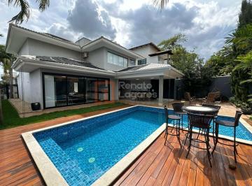 Casa · 306m² · 4 Quartos · 4 Vagas · Sobrado com piscina e jardim de inverno no Condomínio do Lago