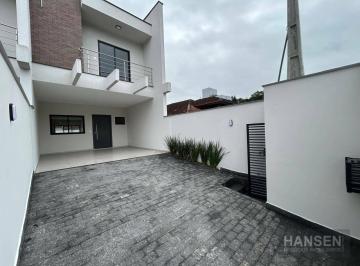 fdbcfe1ec529bed487e0757ce9bd345dd4f4df9a · Sobrado com 1 suíte + 2  dormitórios à venda, 143 m² por R$ 780.000 - Costa e Silva - Joinville/SC