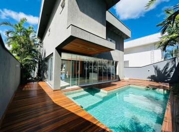 Casa · 440m² · 4 Quartos · 2 Vagas · Sobrado com 4 suítes, home cinema e piscina no Condomínio do Lago