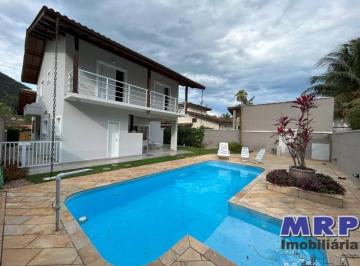 Foto 32 · Casa à venda em Ubatuba. Condomínio Ubatuba Country. Com piscina. 3 suítes