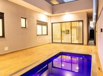 0 · Casa térrea à venda no Residencial Club Portinari–3 suítes, escritório e piscina