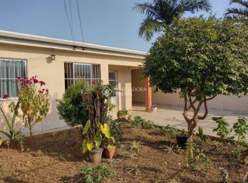 482745_iVGwe_4827456679e76de8f8e.jpg · Casa térrea 140,51m² privativos com pátio frente e fundos.