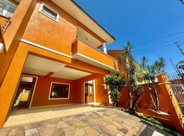 649899_irlz7gI722l7pbTyV1q_649899673b6cb904102.jpg · casa 3 quartos sendo um  suíte master á venda Canoas