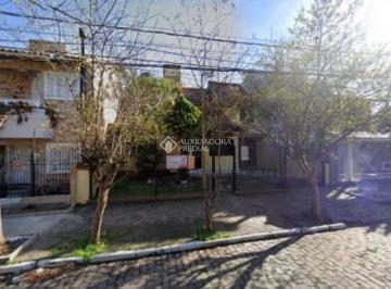 724733_iAX4e3NWZdlQBG54137_724733686fd497c2d15.jpg · Casa à venda no Bairro Harmonia, em Canoas.  Com 210 m² de área privativa e 230 m² de área total, e