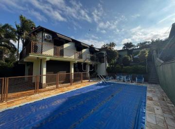 Casa · 387m² · 4 Quartos · 3 Vagas · Casa à venda no Condomínio Marambaia.