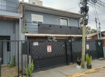 702602_ieJ27LcW1R45Gd2A_70260268700fdf0eccd.jpg · Sobrado no Bairro Camaquã