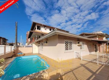 Foto 01 · Casa com piscina em Enseada - Venda