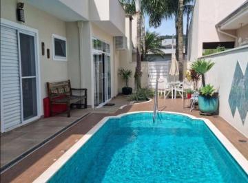 b78531044b65d37ce1629a7ec41f4f0f3c2ee1cd · Belissima casa terrea à venda no Condominio Jardim das Palmeiras  com piscina