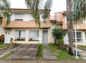 Frente · Casa de condomínio com 150m², 3 quartos e 2 vagas