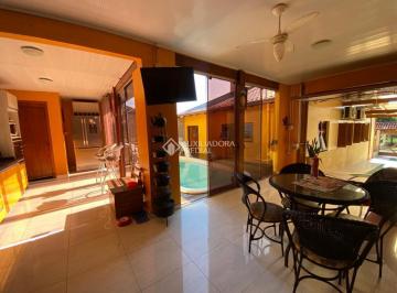 726094_iZR6UP293736_7260946877c9b2ca405.jpg · Casa com churrasqueira, piscina, lareira, poço artesiano e placas solares.