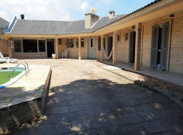 674742_iH938_67474267e2e118da3fc.jpg · Casa térrea, com 3 dormitórios e 4 vagas de garagem em terreno grande com piscina